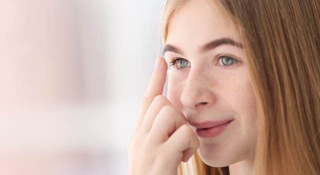 Teenage Putting in Contact Lenses.jpg